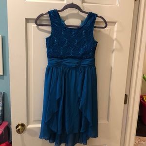 Deep teal dress with lace and sequins on the top.